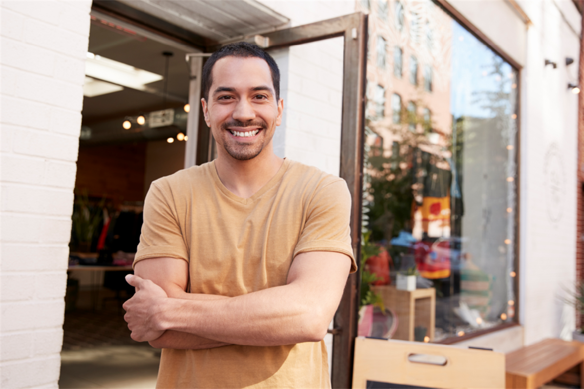 business owner outside store front