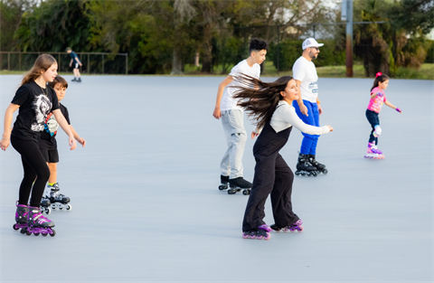 Whispering Pines Park Skate City residents skating
