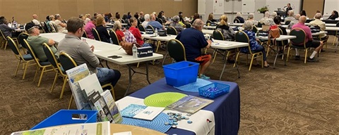 Photo shows a room full of people listening to a previous Utility Systems lunch and learn.