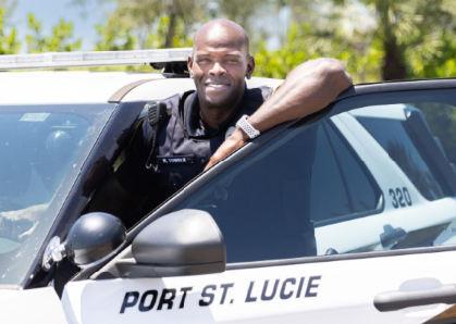 Police officer stepping out of vehicle